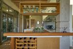 Open and airy kitchen flows from main living area to outdoor terrace